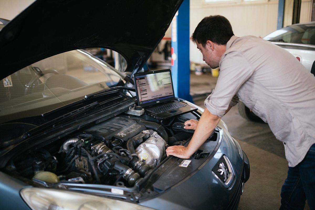 A mechanic running diagnostics